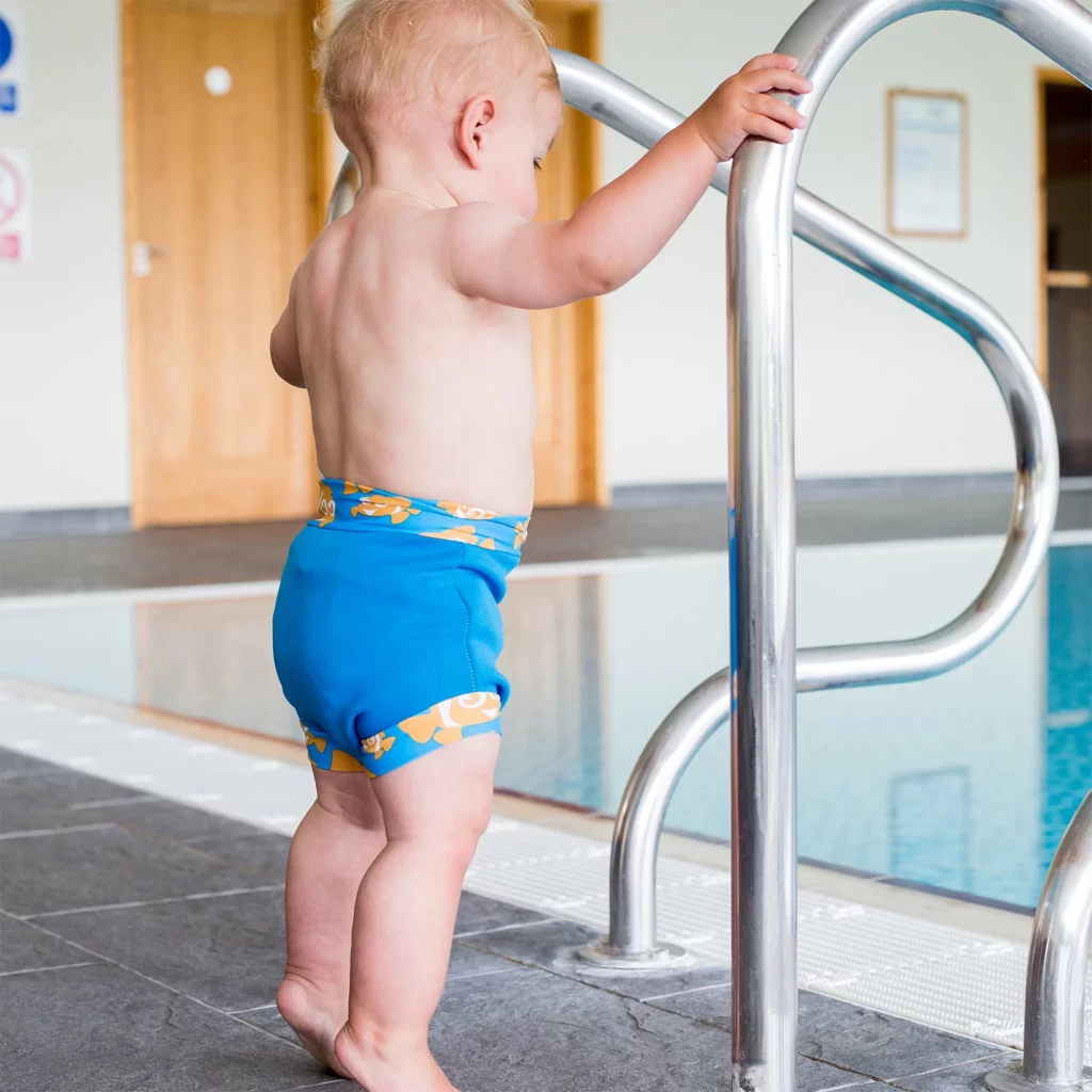 toddler in swimming nappy